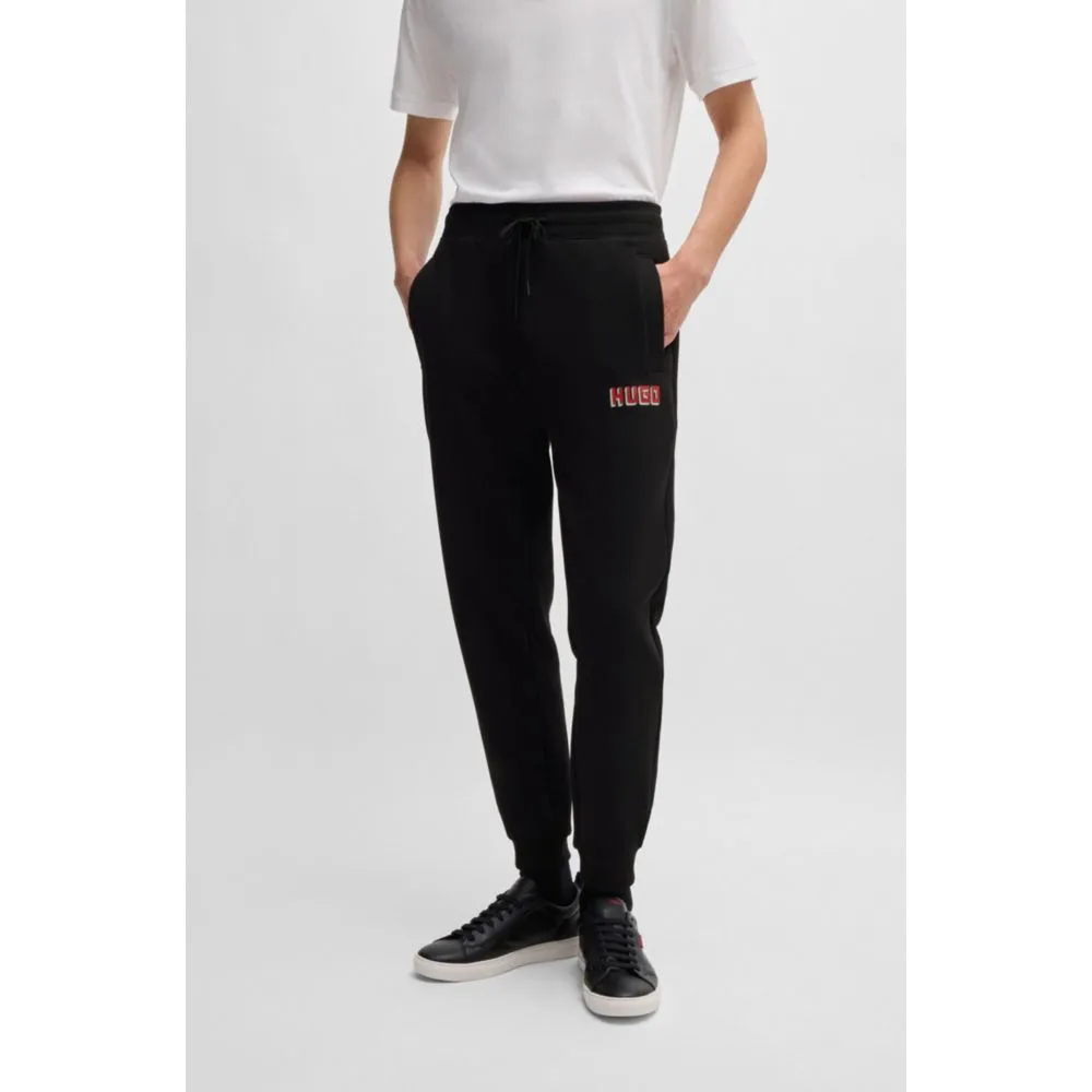 Cotton-terry tracksuit bottoms with logo print