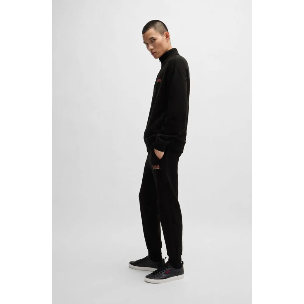 Cotton-terry tracksuit bottoms with logo print