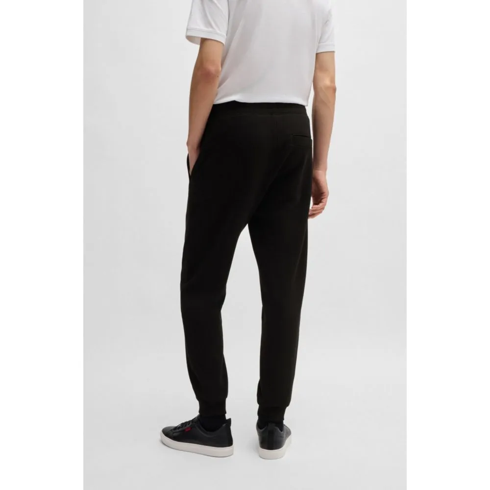 Cotton-terry tracksuit bottoms with logo print