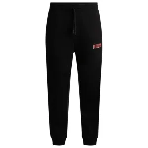 Cotton-terry tracksuit bottoms with logo print