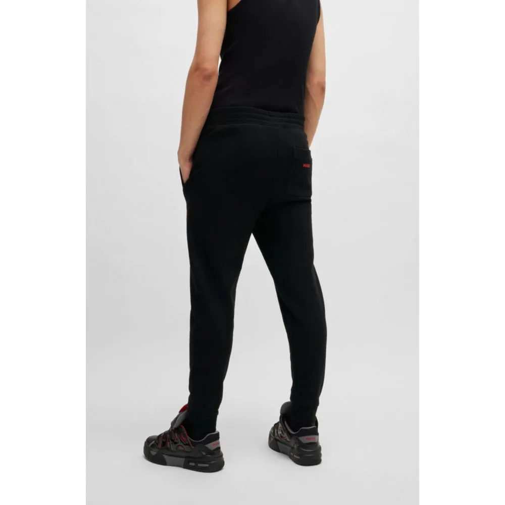 Cotton-terry tracksuit bottoms with puffed flame logo