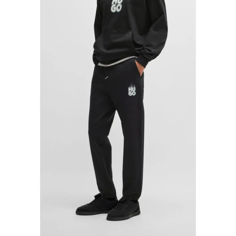 Cotton-terry tracksuit bottoms with smoke logo