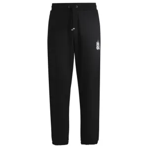Cotton-terry tracksuit bottoms with smoke logo