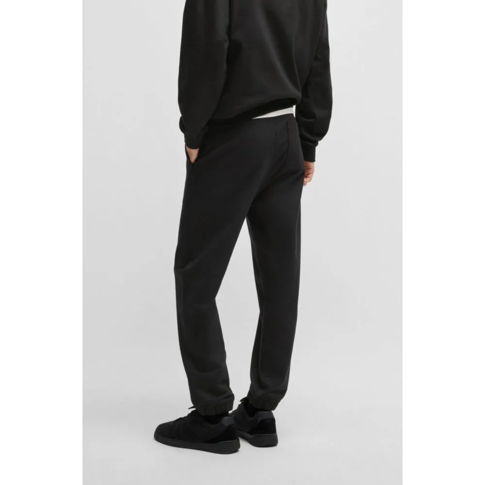 Cotton-terry tracksuit bottoms with smoke logo