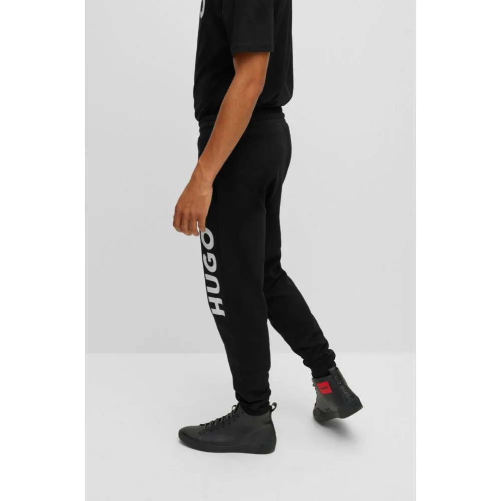 Drawstring tracksuit bottoms in French terry with large logo