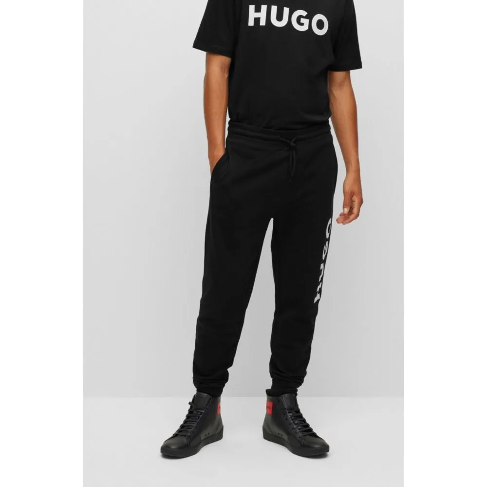 Drawstring tracksuit bottoms in French terry with large logo