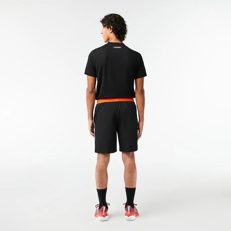 Men's Stretch Tennis Shorts Black / orange Patagonia Clothing