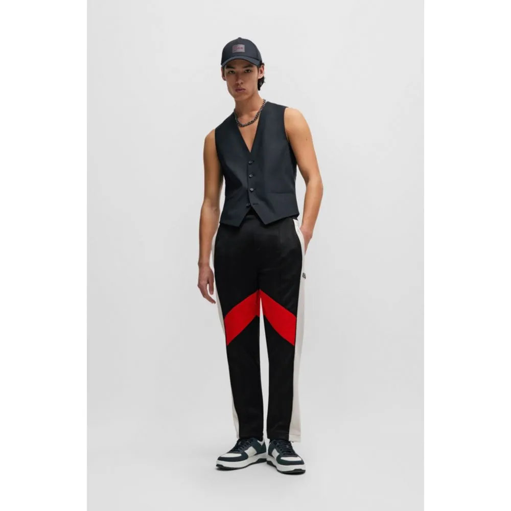 Relaxed-fit tracksuit bottoms with color-blocking