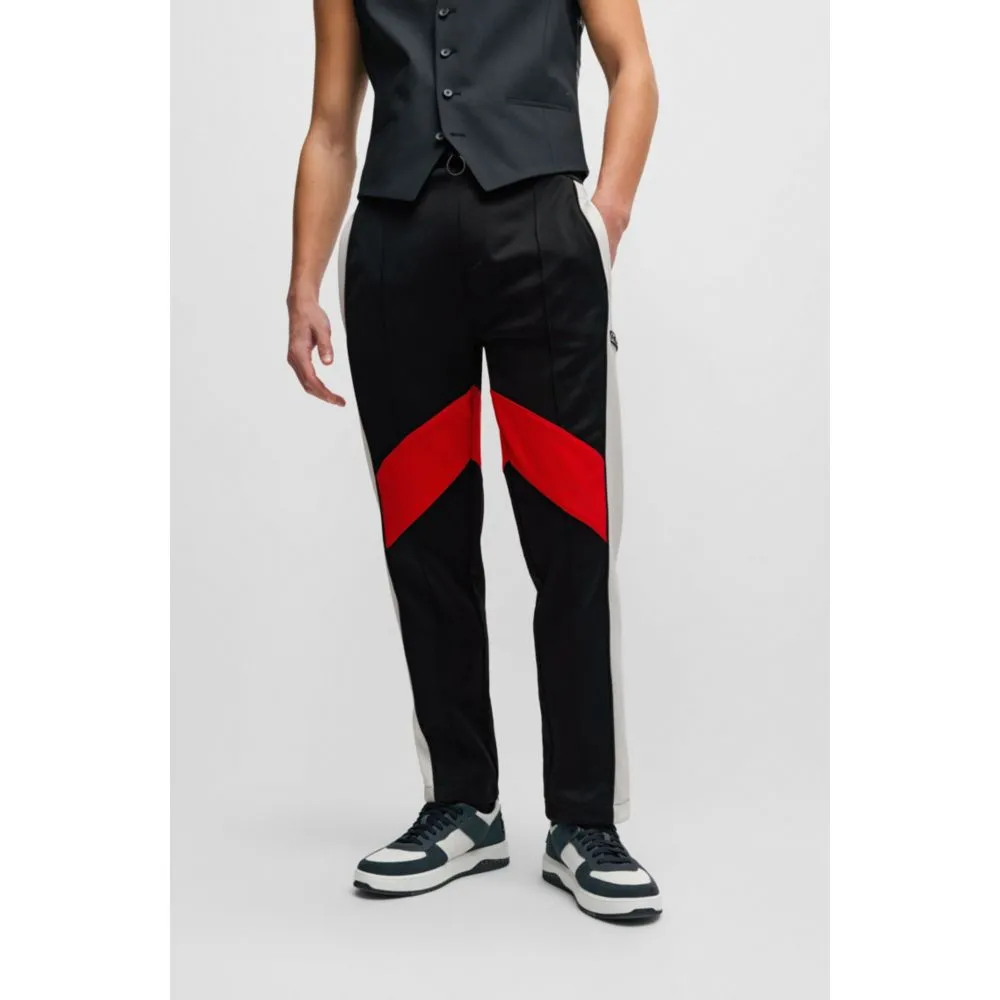 Relaxed-fit tracksuit bottoms with color-blocking
