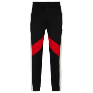 Relaxed-fit tracksuit bottoms with color-blocking