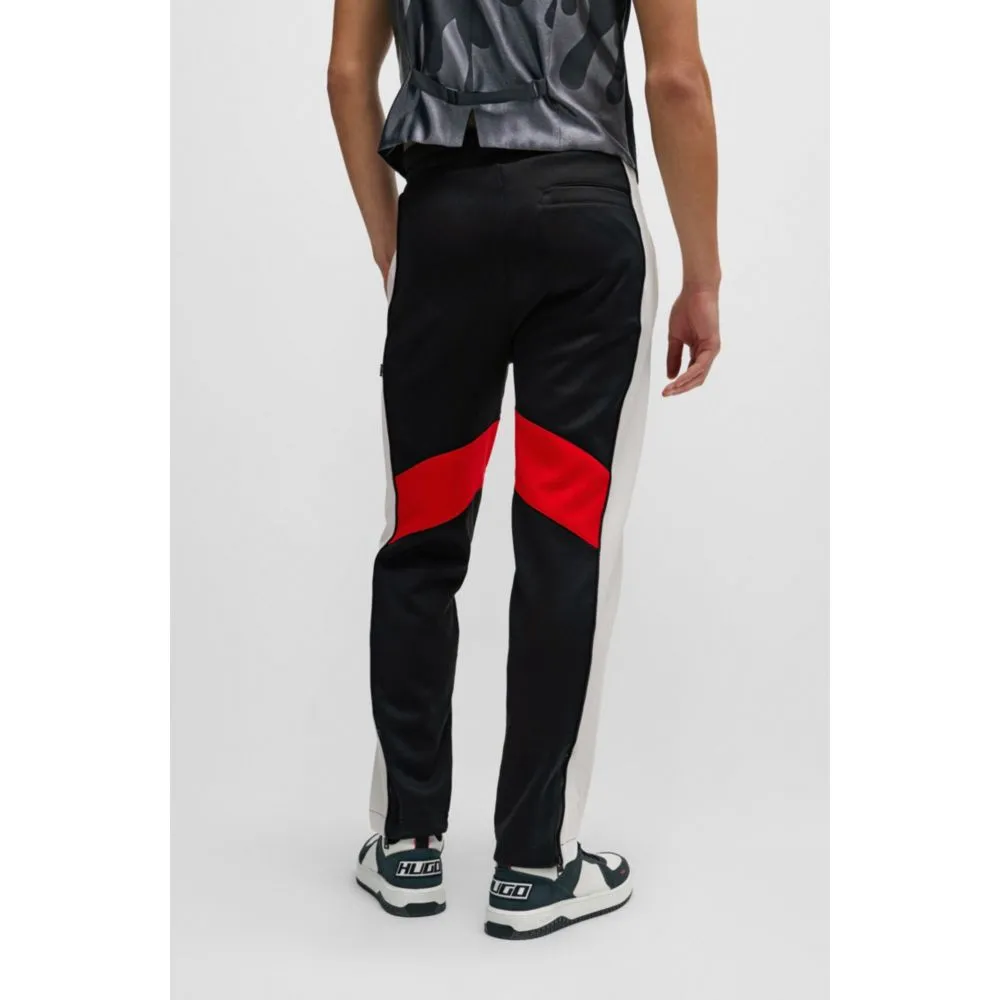 Relaxed-fit tracksuit bottoms with color-blocking