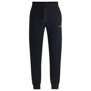 tracksuit bottoms with heart logo