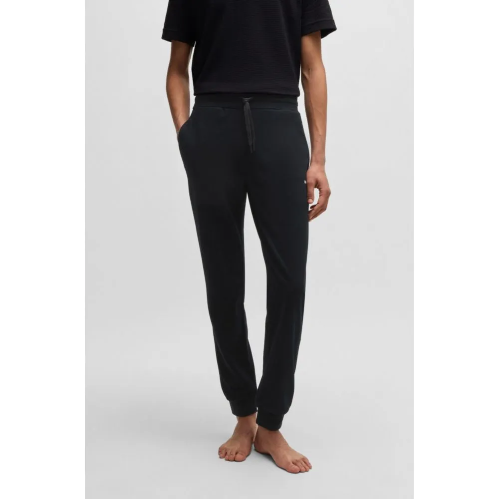 tracksuit bottoms with heart logo