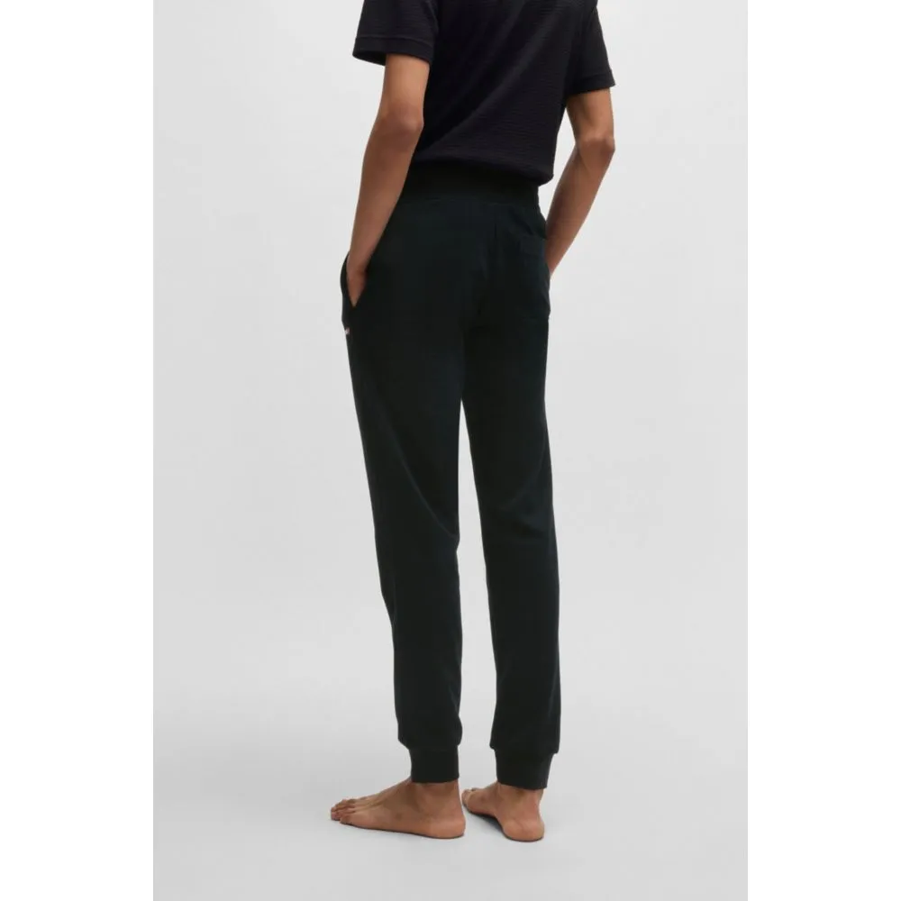 tracksuit bottoms with heart logo