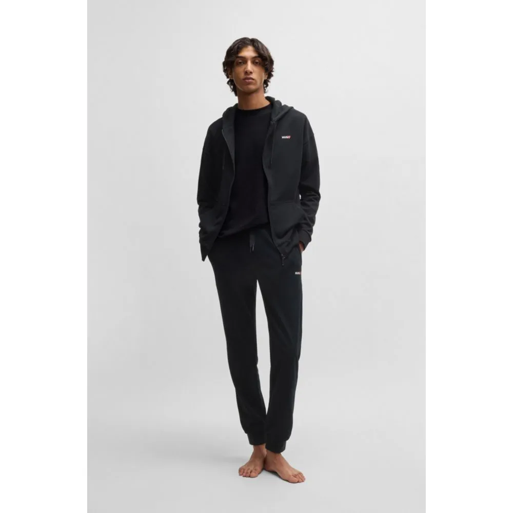 tracksuit bottoms with heart logo