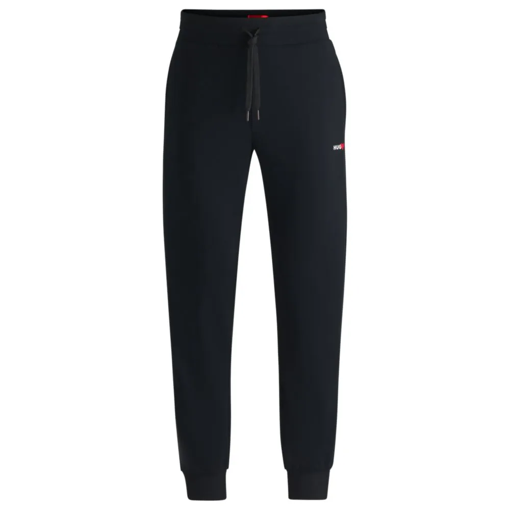 tracksuit bottoms with heart logo
