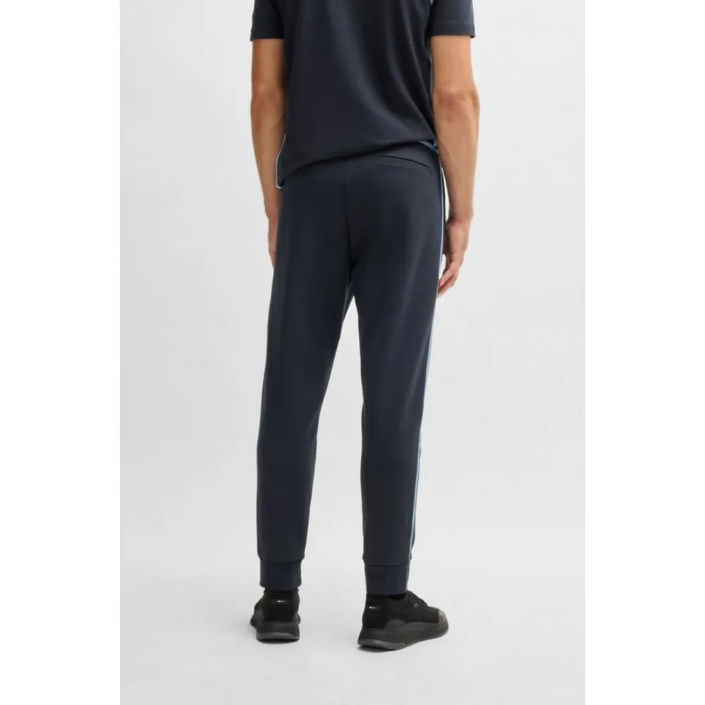 Tracksuit bottoms with tape and logo