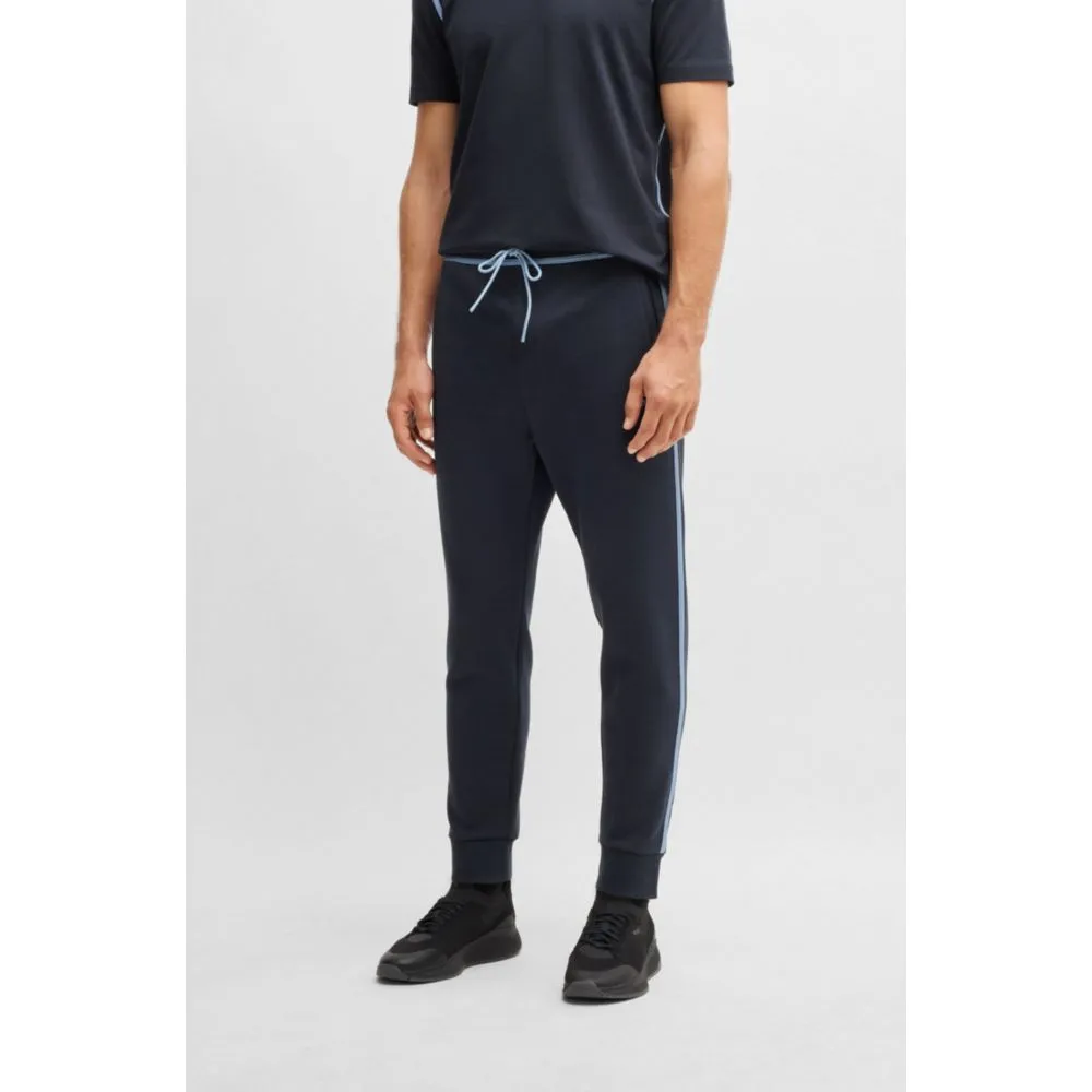 Tracksuit bottoms with tape and logo