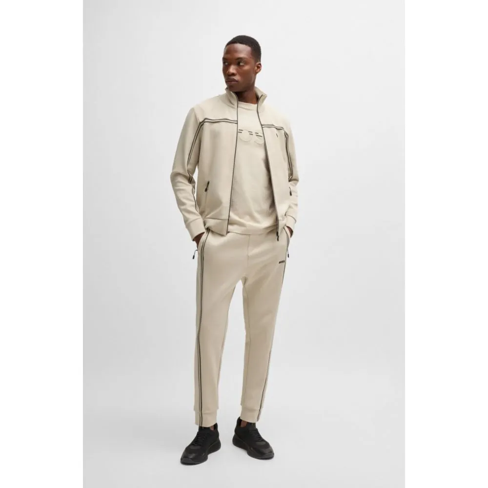 Tracksuit bottoms with tape inserts